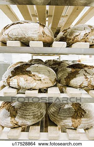 Some bread in a breadshelf View Large Photo Image Picture - Some bread in a breadshelf. Fotosearch
