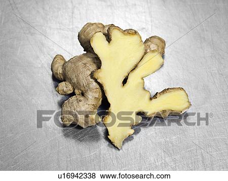 Stock Photo - Some fresh cut ginger. Fotosearch