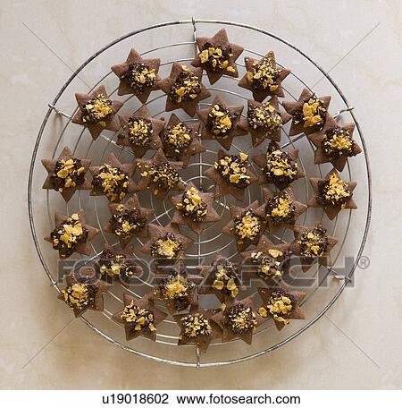 star shaped, brown christmas cookies View Large Photo Image Stock Image - star shaped, brown christmas cookies. Fotosearch