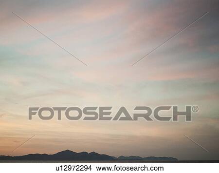 sunset at the beach View Large Photo Image Picture - sunset at the beach. Fotosearch