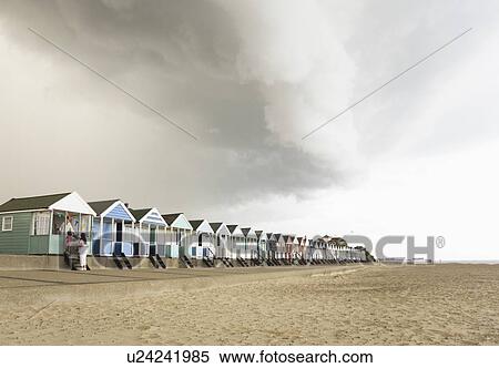 Taking shelter under Beach hut View Large Photo Image Stock Photography - Taking shelter under Beach hut. Fotosearch