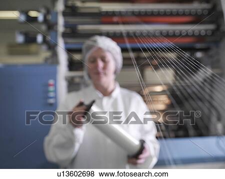 Technician Weaving Medical Product View Large Photo Image Stock Photo - Technician Weaving Medical Product. Fotosearch