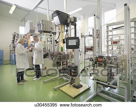 Stock Photography - Technicians Weaving Medical Product. Fotosearch