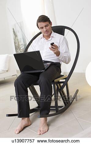 teleworking man in home office View Large Photo Image Stock Photo - teleworking man in home office. Fotosearch