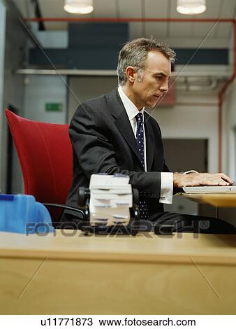 Stock Image - The portrait of a businessman. Fotosearch
