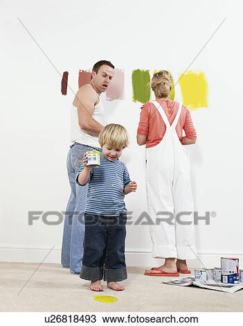 Toddler boy pouring paint onto carpet View Large Photo Image Stock Image - Toddler boy pouring paint onto carpet. Fotosearch