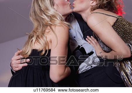 two women kissing View Large Photo Image Picture - two women kissing. Fotosearch