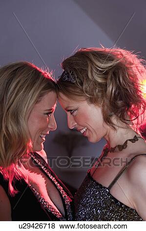 two women looking at each other View Large Photo Image Stock Photo - two women looking at each other. Fotosearch