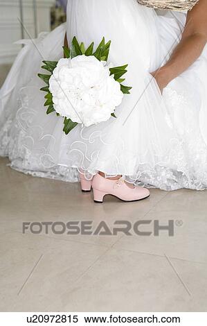 wedding bouquet and dress View Large Photo Image Stock Photography - wedding bouquet and dress. Fotosearch