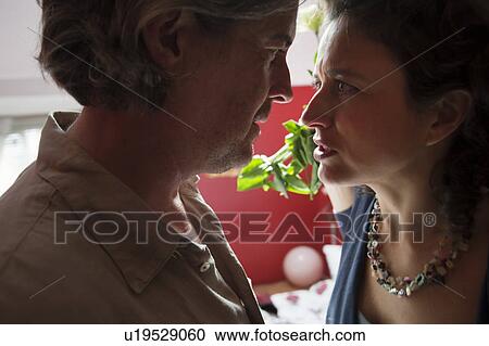 Stock Image - woman arguing at man. Fotosearch