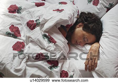 woman asleep in bed View Large Photo Image Stock Photo - woman asleep in bed. Fotosearch