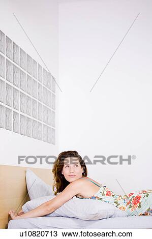 Woman at home View Large Photo Image Stock Image - Woman at home. Fotosearch