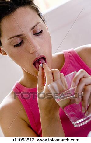 Stock Image - Woman at home. Fotosearch