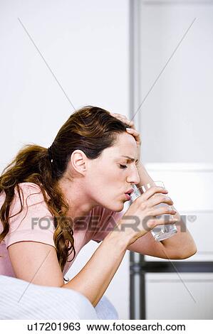 Stock Image - Woman at home. Fotosearch