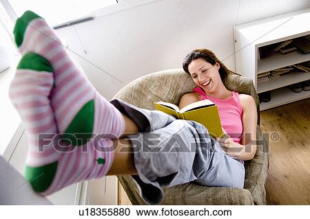 Woman at home View Large Photo Image Stock Image - Woman at home. Fotosearch