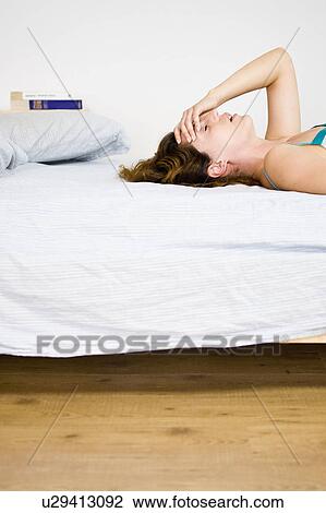 Stock Image - Woman at home. Fotosearch