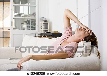 Stock Photograph - Woman at home. Fotosearch