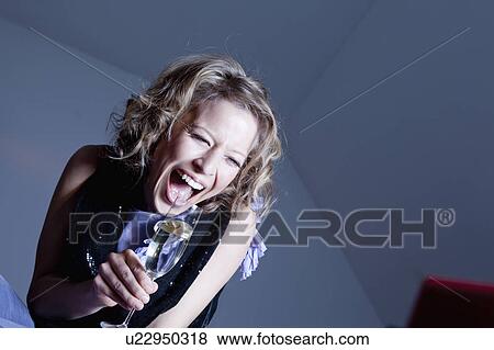 woman drinking champagne laughing View Large Photo Image Stock Photo - woman drinking champagne laughing. Fotosearch