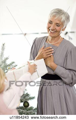 woman getting a present View Large Photo Image Stock Image - woman getting a present. Fotosearch