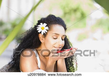 woman in a garden View Large Photo Image Picture - woman in a garden. Fotosearch