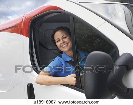 Stock Photo - woman in delivery van. Fotosearch