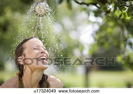 Stock Photo - woman in nature. Fotosearch