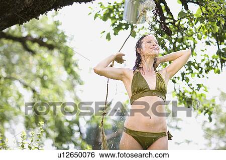 Stock Photograph - woman in nature. Fotosearch