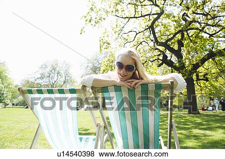 Stock Photo - Woman in the park. Fotosearch