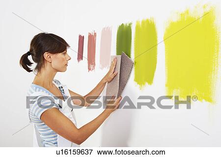 Woman looking at carpet samples. View Large Photo Image Stock Photo - Woman looking at carpet samples.. Fotosearch