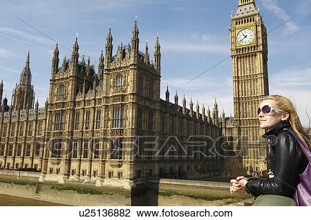 Woman next to big ben View Large Photo Image Stock Image - Woman next to big ben. Fotosearch