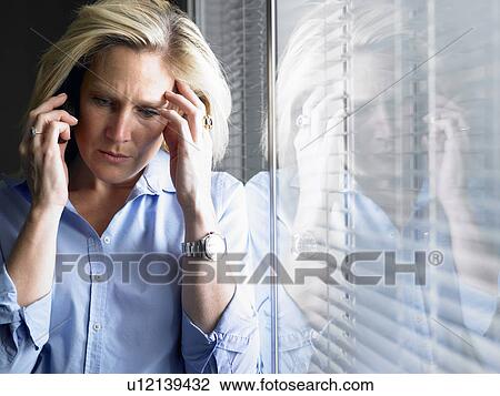 Stock Image - Woman on the phone. Fotosearch