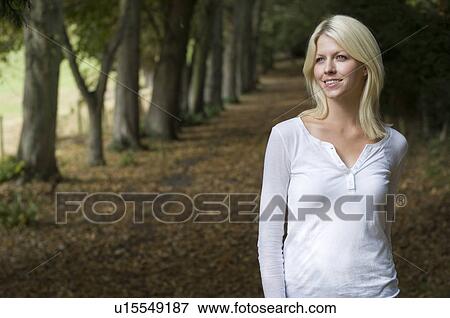 Stock Photo - woman reflecting in garden. Fotosearch