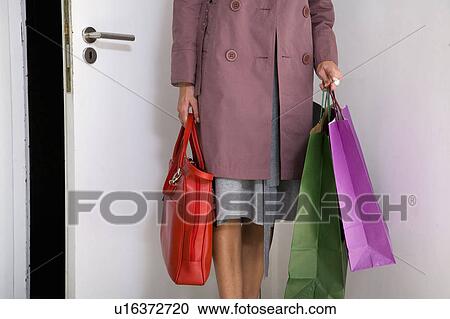 Stock Image - Woman shopping. Fotosearch