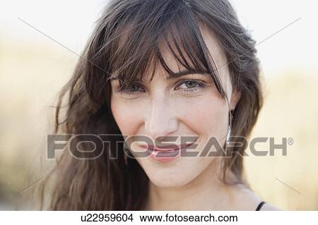 woman smiling at viewer View Large Photo Image Picture - woman smiling at viewer. Fotosearch