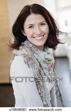woman smiling at viewer View Large Photo Image Stock Image - woman smiling at viewer. Fotosearch