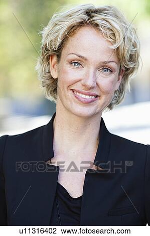 woman smiling at viewer View Large Photo Image Stock Image - woman smiling at viewer. Fotosearch