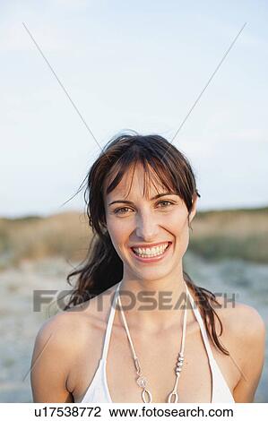 woman smiling at viewer View Large Photo Image Stock Image - woman smiling at viewer. Fotosearch