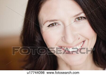 woman smiling at viewer View Large Photo Image Stock Photo - woman smiling at viewer. Fotosearch