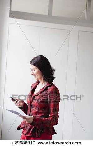 woman using cell phone View Large Photo Image Stock Image - woman using cell phone. Fotosearch