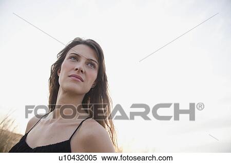 woman walking on the beach View Large Photo Image Stock Photography - woman walking on the beach. Fotosearch