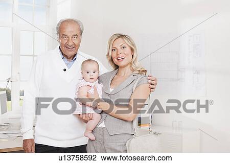Woman with baby and her boss. View Large Photo Image Stock Image - Woman with baby and her boss.. Fotosearch