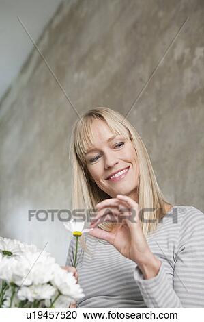 woman with flowers View Large Photo Image Stock Image - woman with flowers. Fotosearch