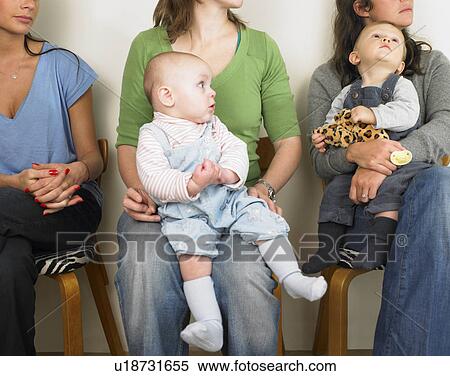 Women and babies in waiting room View Large Photo Image Stock Photography - Women and babies in waiting room. Fotosearch