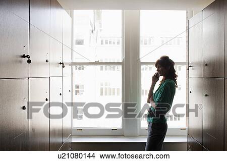 Picture - Women in a locker room. Fotosearch