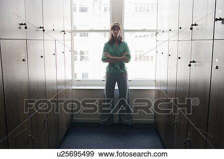 Stock Photo - Women in a locker room. Fotosearch