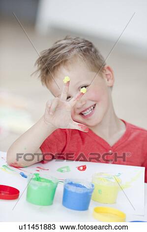 young boy playing with colours View Large Photo Image Stock Image - young boy playing with colours. Fotosearch