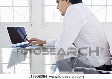 Young businessman starting enterprise View Large Photo Image Picture - Young businessman starting enterprise. Fotosearch