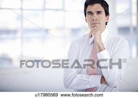 Stock Photo - Young businessman starting enterprise. Fotosearch