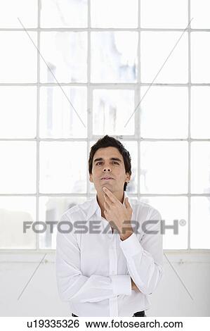 Young businessman starting enterprise View Large Photo Image Stock Photograph - Young businessman starting enterprise. Fotosearch