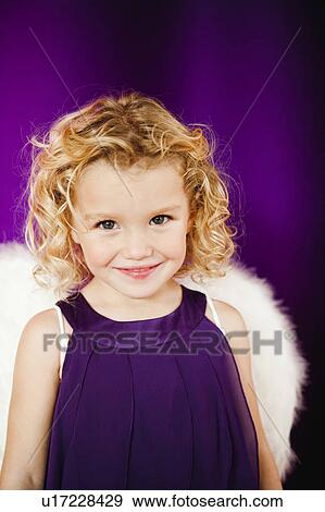 Stock Photo - young girl in angel costume. Fotosearch